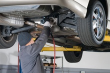 B&D Repair LLC guy working on car in shop